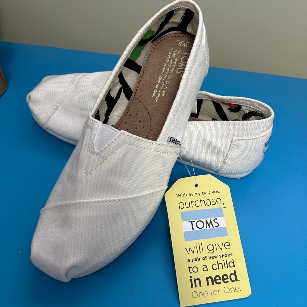 TOMS Classic White Canvas Slip-Ons